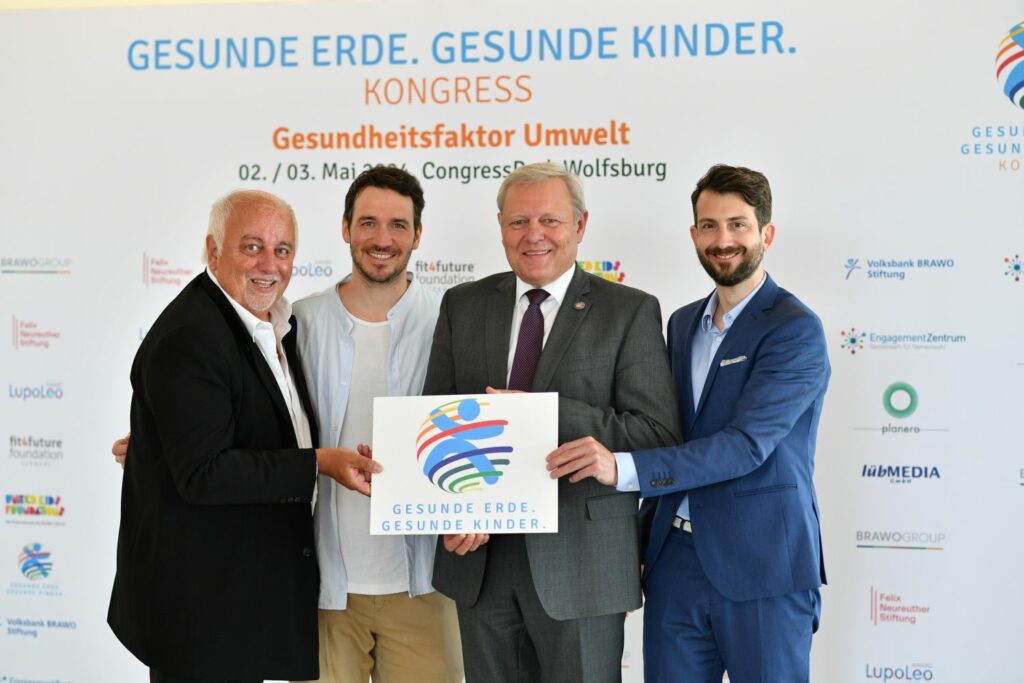 Robert Lübenoff, Felix Neureuther, Jürgen Brinkmann und Florian Kreuzpointner beim Kongress Gesunde Erde. Gesunde Kinder.